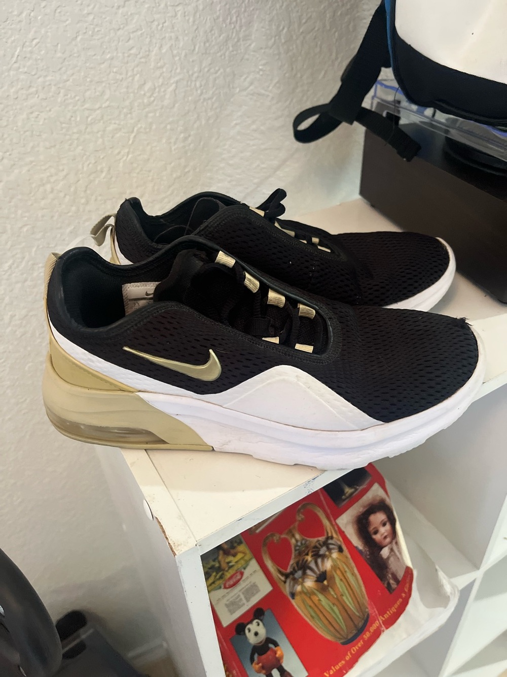 Nike Black and Gold Slip-On Athletic Sneakers